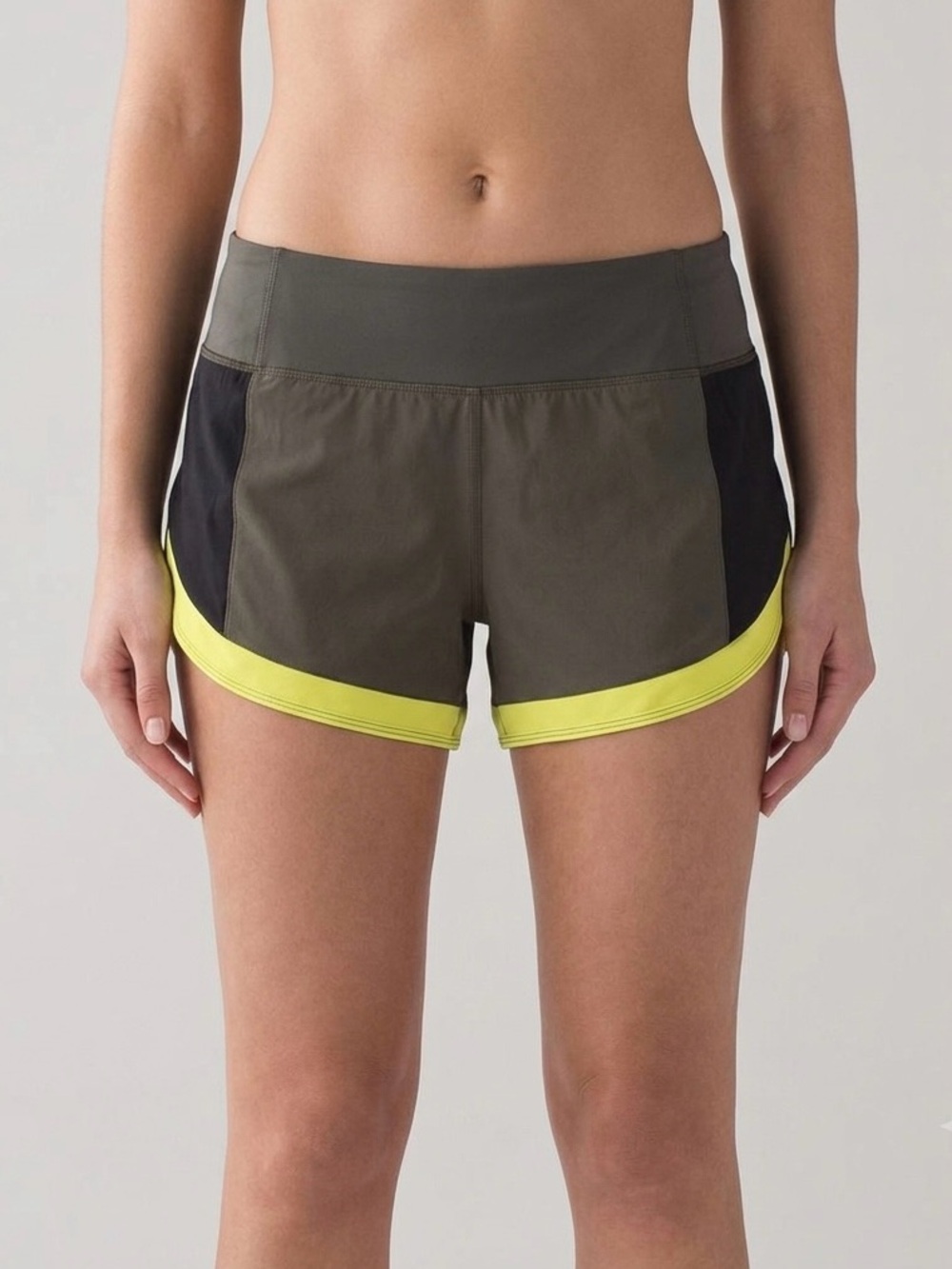 Athleta Running Free Short Size M Colorblock Women’s Olive Green Yellow Black